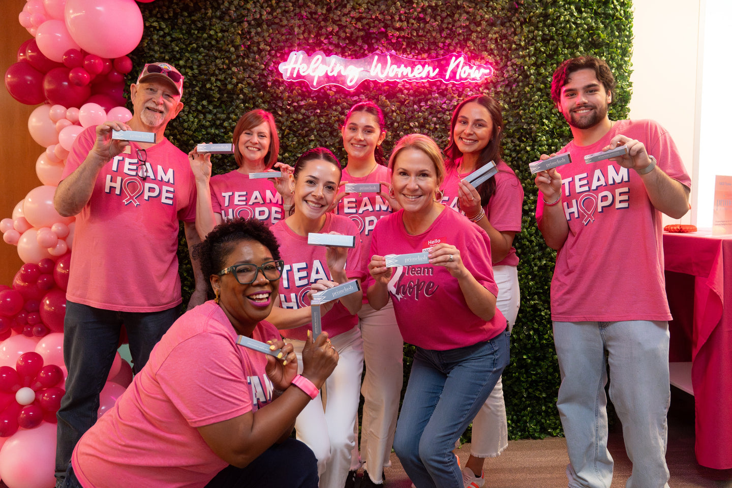 Team Hope volunteers at a Prime Prometics breast cancer charity event.