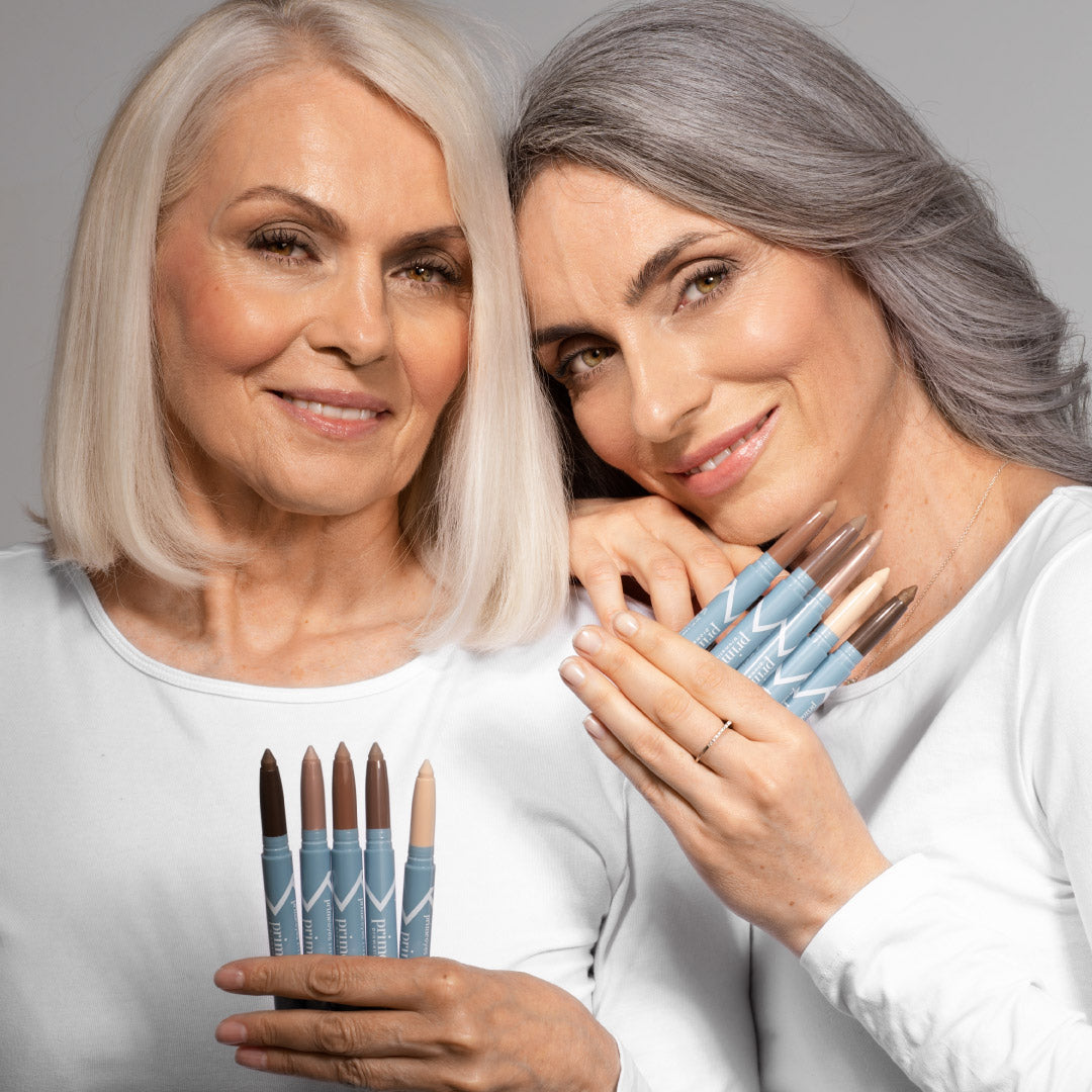 Two mature women smiling, Prime Prometics customer photo.