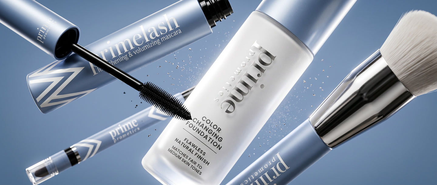 Various blue and silver Prime lash and makeup products, including mascara, foundation, and a makeup brush, floating against a blue background.